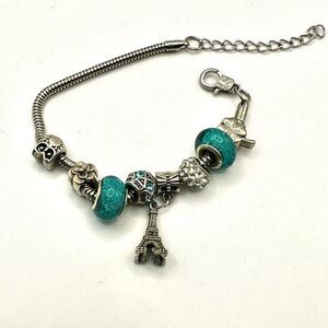Green beaded rhinestone Eiffel Tower shamrock owl charm bracelet
